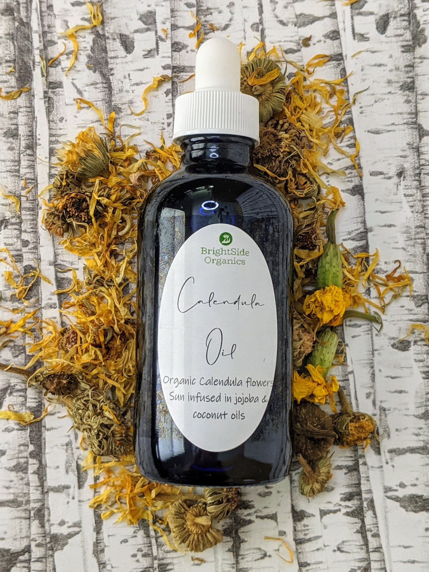 Organic Calendula Oil Sun infused flowers in jojoba & coconut oil